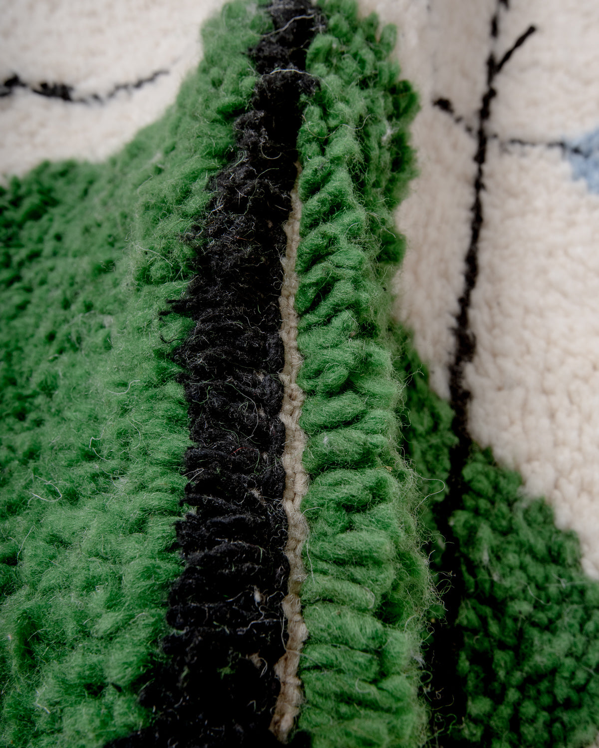 Modern, designer, handcrafted Berber rug from Morocco. Beniourain carpet with beautiful colours and patterns and fluffy wool texture.